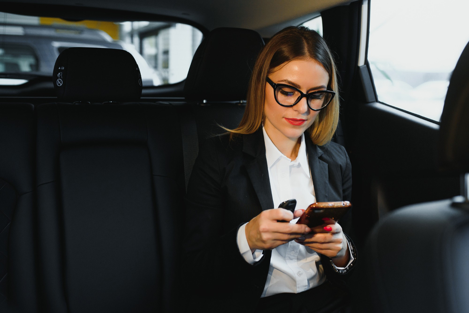 female business traveler using corporate transportation